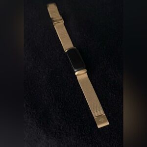 Fitbit Inspire 3 with Fitbit gold mesh band- like new